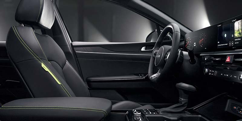 2026 Kia K5 interior with sport seats and steering wheel